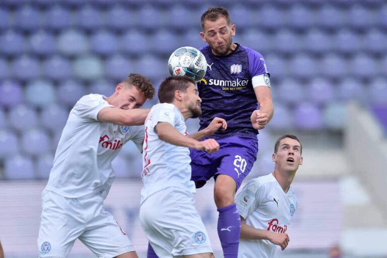 Marc Heider im Zweikampf gegen Aleksandar Ignjovski (Kiel); Foto imago images / osnapix
