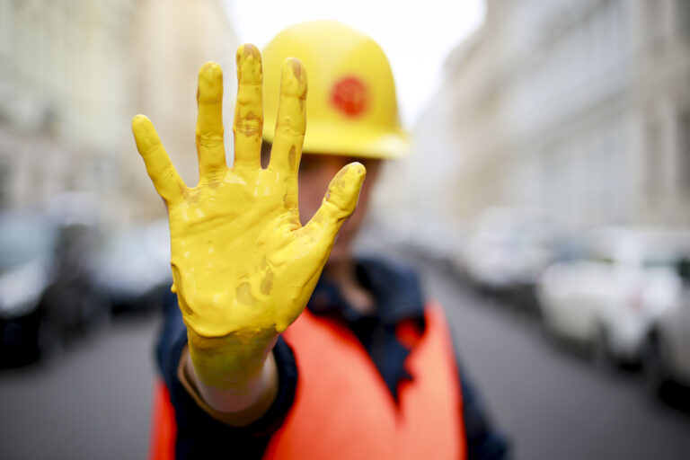 Gelbe Hand / Foto: IG BAU