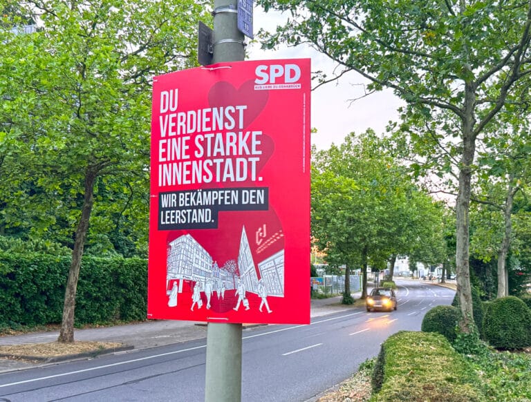 SPD Plakat mit Firmenlogos in Osnabrück (Gesamtstadt)